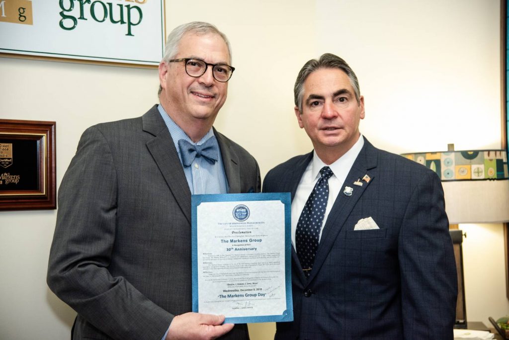 The city of Springfield pronounces Dec. 5, 2018 The Markens Group Day. Ben Markens, president of TMG (left) poses with Springfield mayor Domenic Sarno